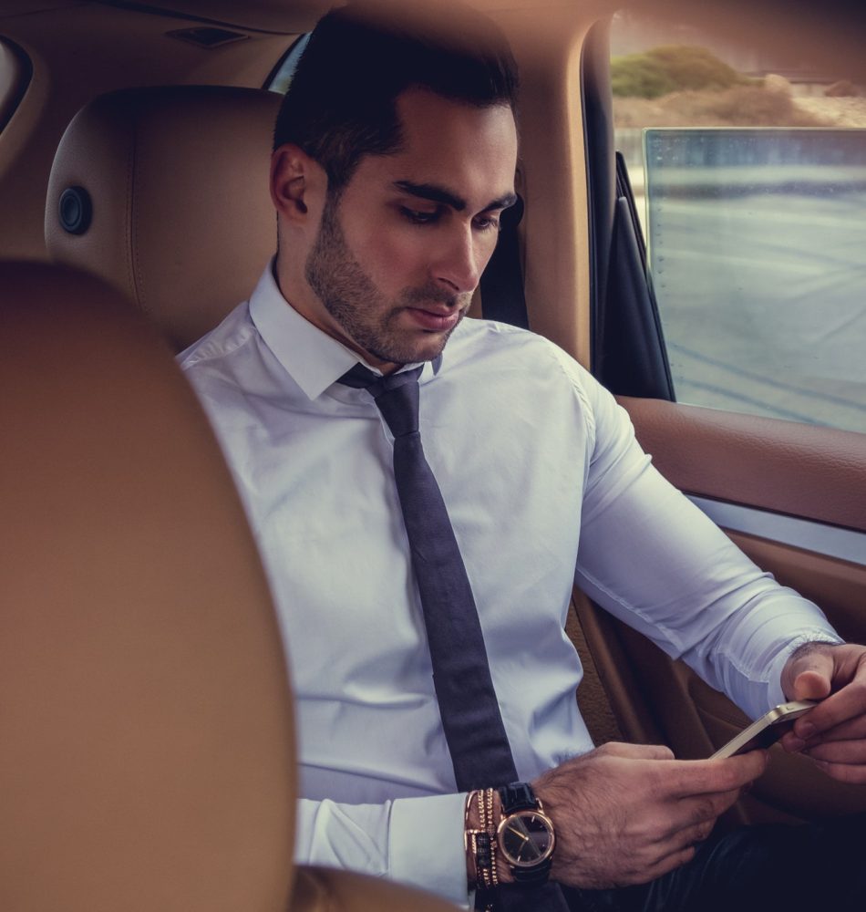businessman-with-laptop-in-the-car-.jpg